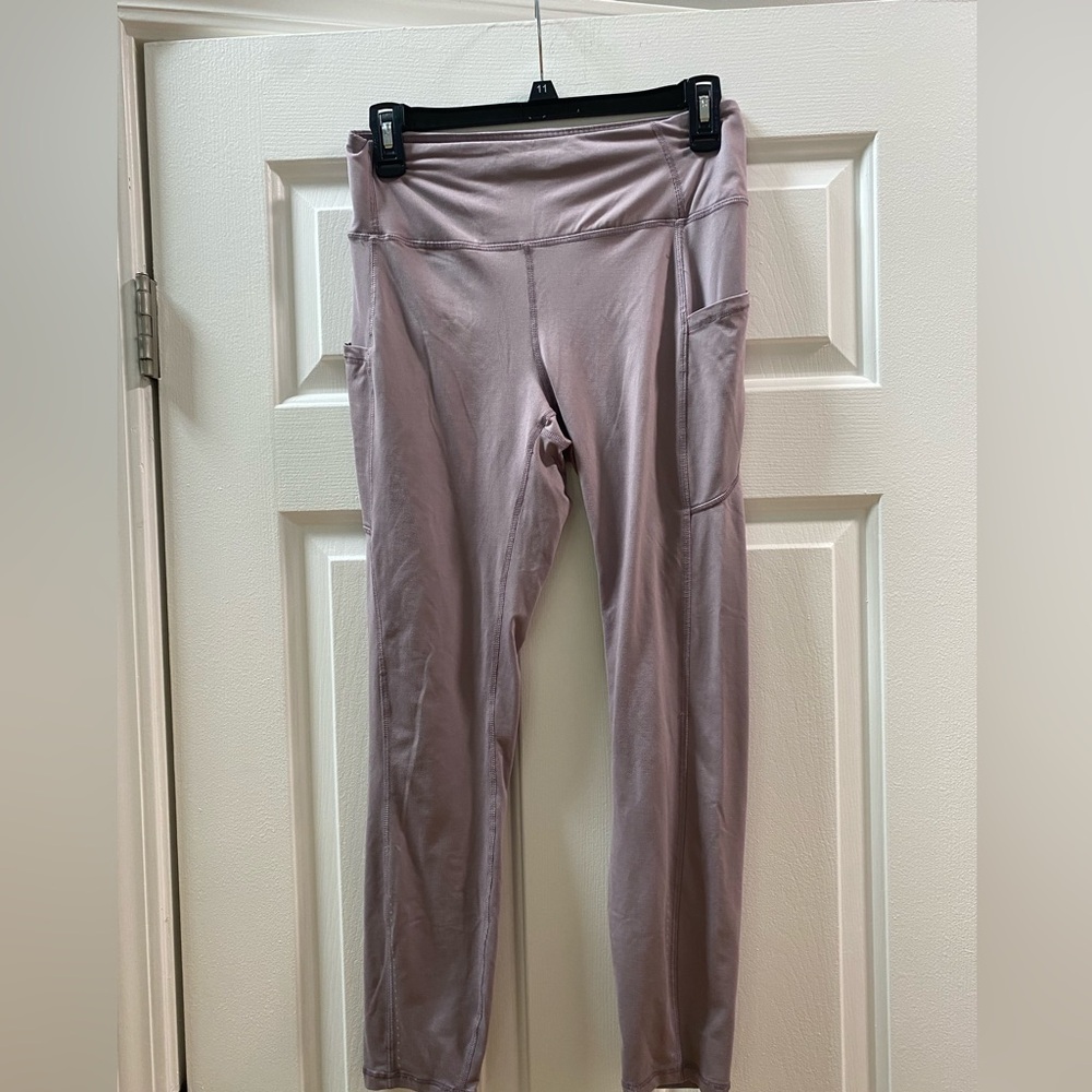 Gently used light purple leggings with pockets